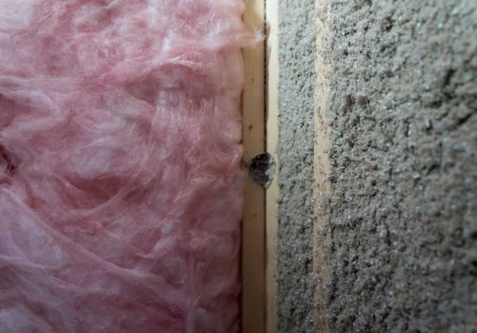 Can you blow cellulose insulation over existing fiberglass?